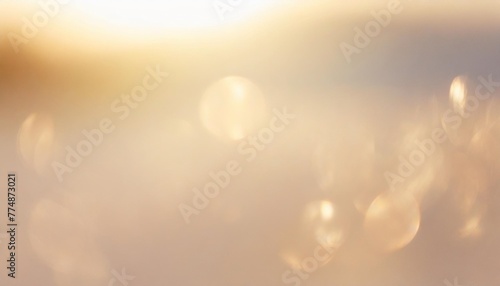 white shiny glare from sunlight on beige background abstract nature photo with sunshine flare neutral color minimal aesthetic light effect optical blur glow defocused natural backdrop © Claudio