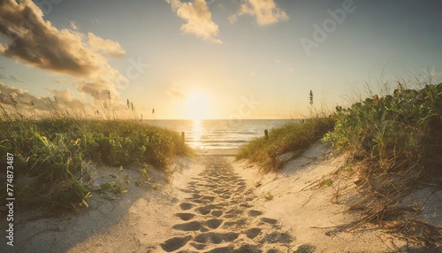 path on the sand going to the ocean in miami beach florida at sunrise or sunset beautiful nature landscape retro instagram filter and soft focus for vintage looks
