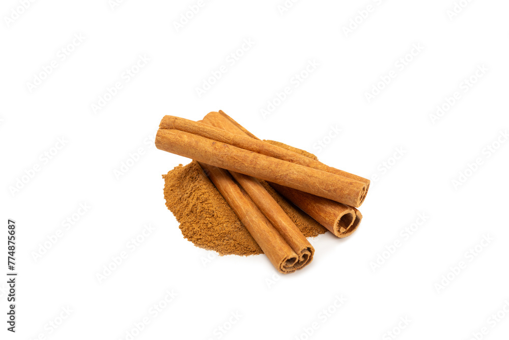 Cinnamon powder isolated on white background. Spicy spice for baking, desserts and drinks. Fragrant ground cinnamon. Cinnamon powder isolated on white background. Spicy spice for baking, desserts and drinks. Fragrant ground cinnamon.