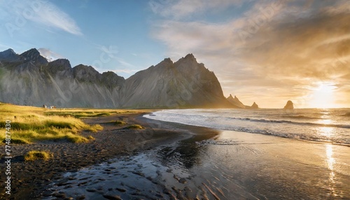 vestrahorn mountaine on stokksnes cape in iceland during sunset amazing iceland nature seascape popular tourist attraction best famouse travel locations scenic image of iceland