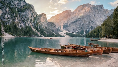 lake braies also known as pragser wildsee or lago di braies in dolomites mountains sudtirol italy romantic place with typical wooden boats on the alpine lake hiking travel and adventure