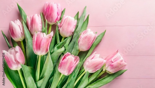 Tulip Dreamland: Top View Display of Pink Tulip Bouquet on Pastel Pink