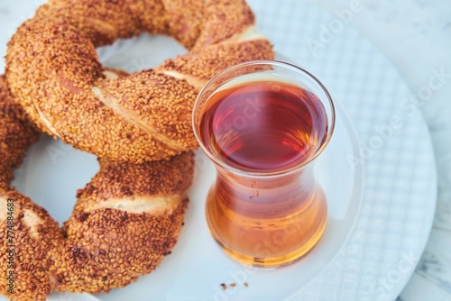 Traditional Turkish breakfast. National food, Turkish tea and semite bun. photo