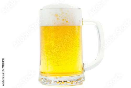 Frothy beer in mug against white