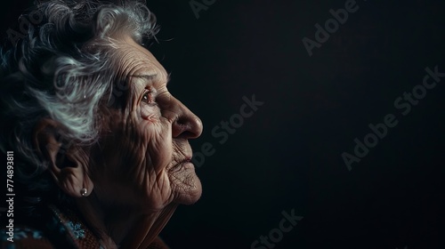 Generative AI : Portrait of elderly woman on dark background. Toned. photo