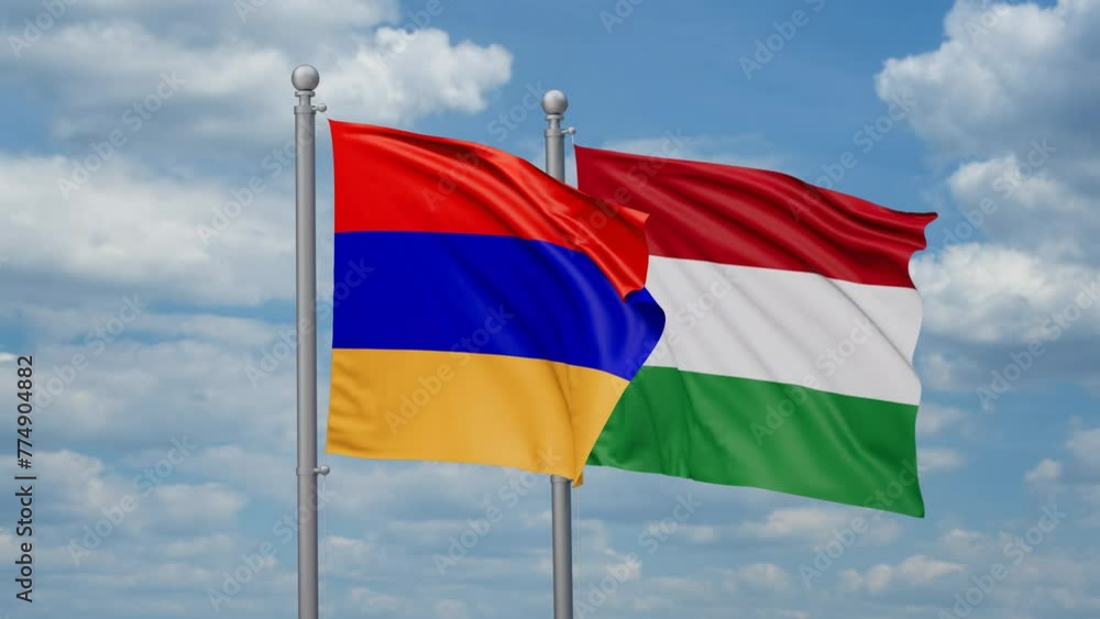 Hungary and Armenia two flags waving together, looped video, two country relations concept Hungary and Armenia two flags waving together, looped video, two country relations concept