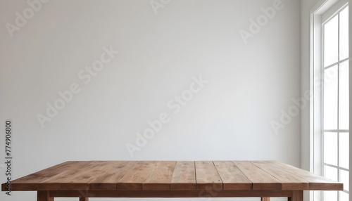 Empty wooden table in a clean, elegant modern indoor home interior 