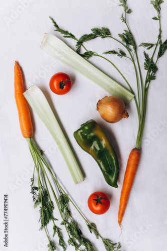 Different vegetables on a white material