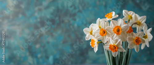 Vase With White and Orange Flowers