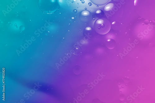 Creative multicolored gradient background with oil drops