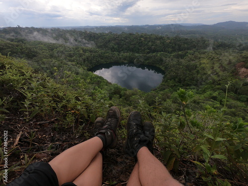 turista em mirante da mina f12 em serra do navio, amapá  photo