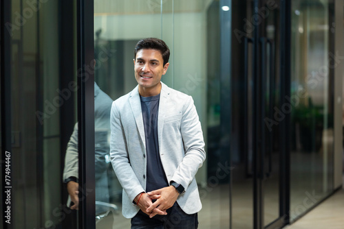 Portrait of happy business man. Hispanic latin male. Portrait of handsome caucasian man in formal suit looking at camera smiling