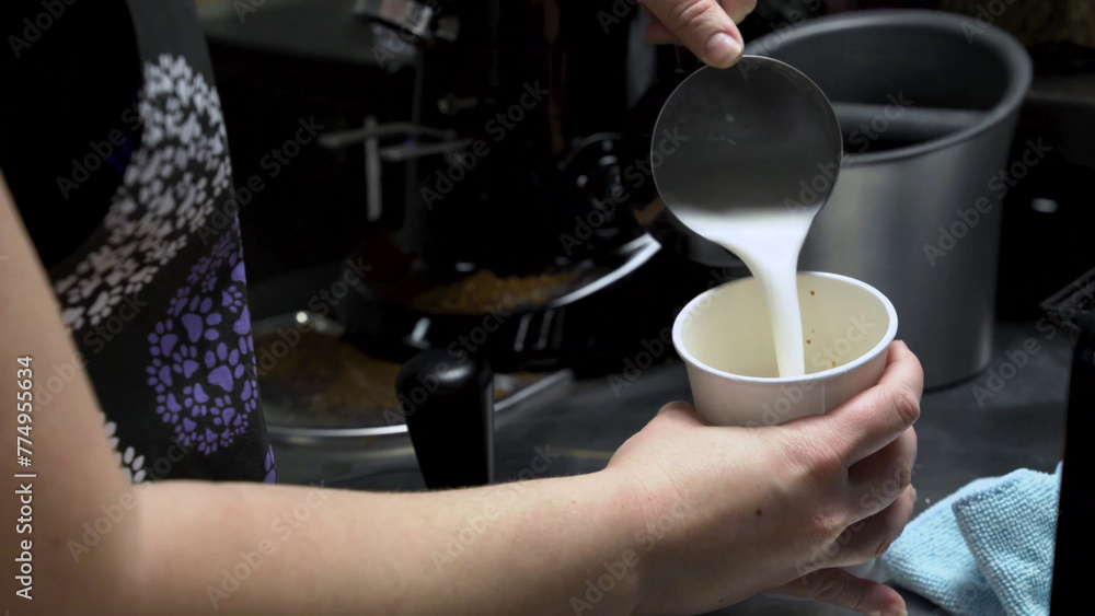 pouring Milk into a cup, milk shop