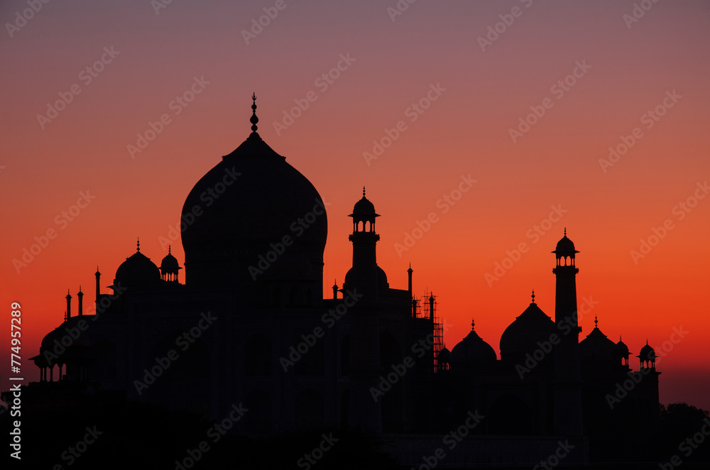 Taj Mahal during Sunset, Silhouette, Colorful sky, Agra, Uttar Pradesh, India.