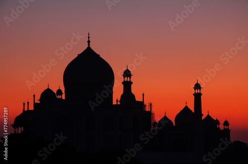 Taj Mahal during Sunset, Silhouette, Colorful sky, Agra, Uttar Pradesh, India.