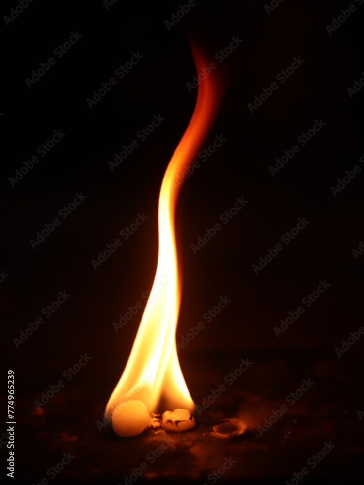 Vertical shot of the camphor burning Vertical shot of the camphor burning