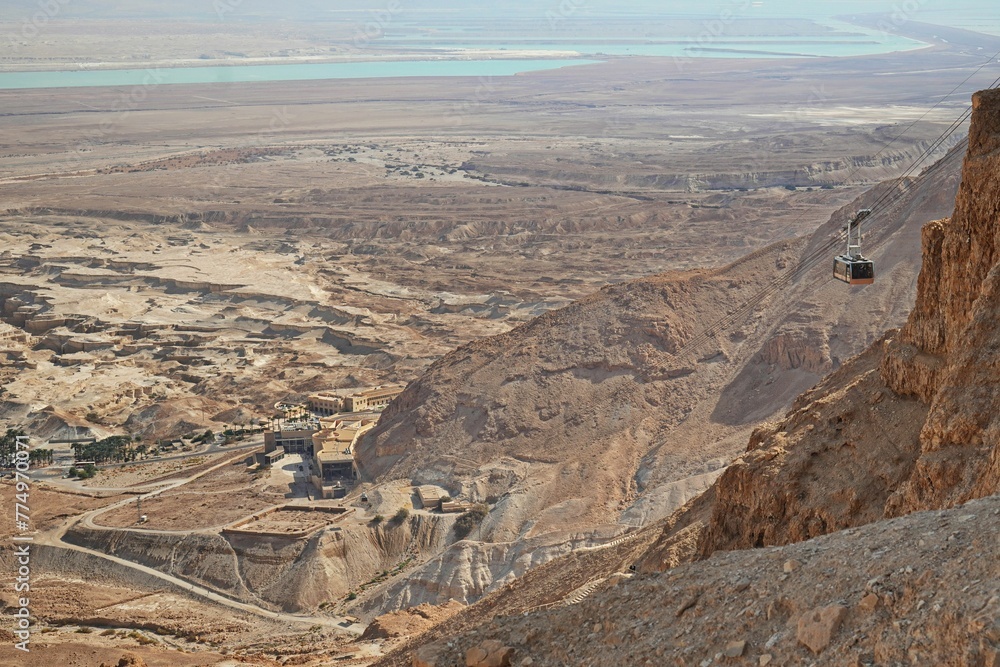 Aerial view of Masada with ancient fortress and rocky mountains in Israel