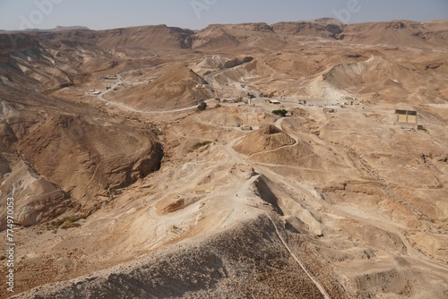 Aerial view of Masada with ancient fortress and rocky cliffs in Israel