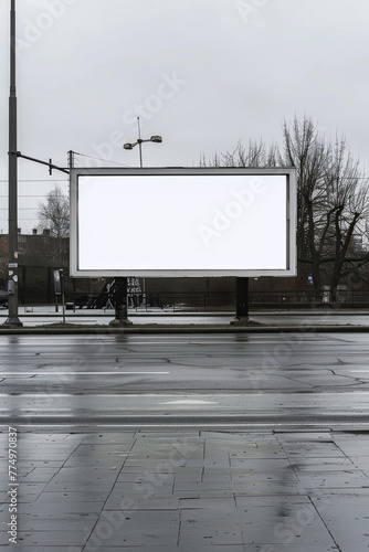 A blank billboard besides a road