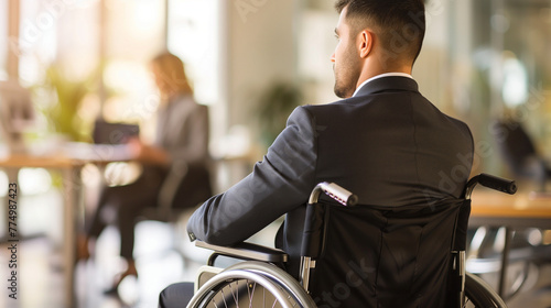 Confident Latino Man Sitting in a Wheelchair in a Corporate Business Environment, Inclusion