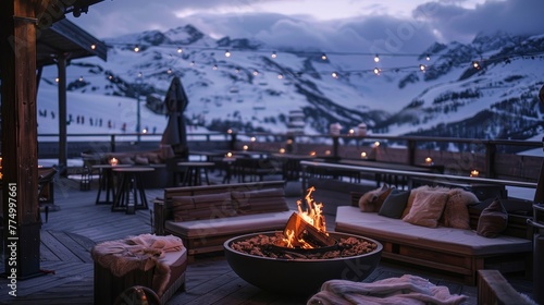 A cozy outdoor fireplace on a snowy restaurant terrace, with ski slopes and mountains in the background, capturing a luxurious winter travel lifestyle