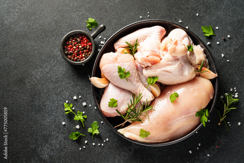 Chicken wing, raw chicken meat with herbs.