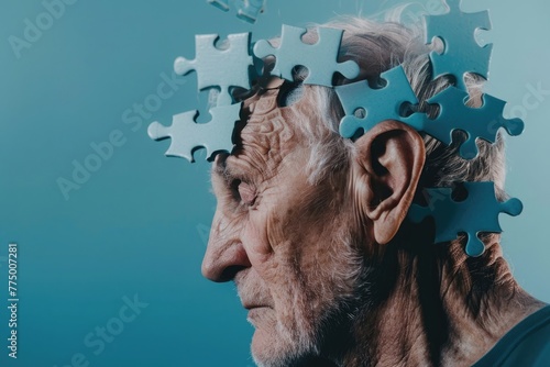 Elderly senior old thinking man suffering from dementia with puzzles on head