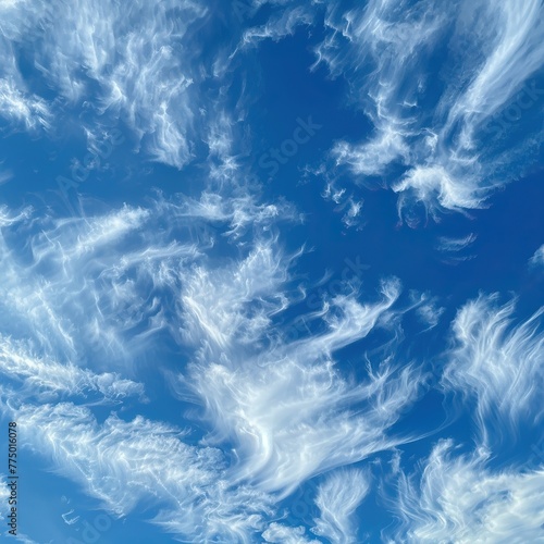 a blue sky full of cirrus fibrata clouds