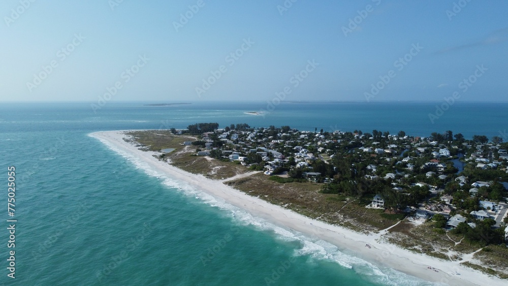 Aerial view of Anna Maria Island on Florida's Gulf Coast in blue sky background Aerial view of Anna Maria Island on Florida's Gulf Coast in blue sky background