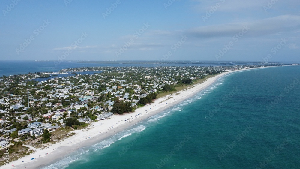 Aerial view of Anna Maria Island on Florida's Gulf Coast in blue sky background