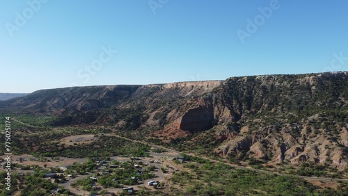 Aerial view of a canyon park with geological formations in Texas in blue sky background