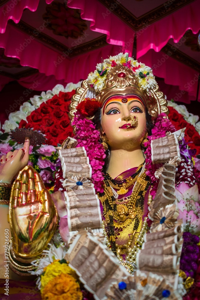 Vertical shot of an idol of Maa Durga being worshipped at a mandal in Mumbai for Navratri