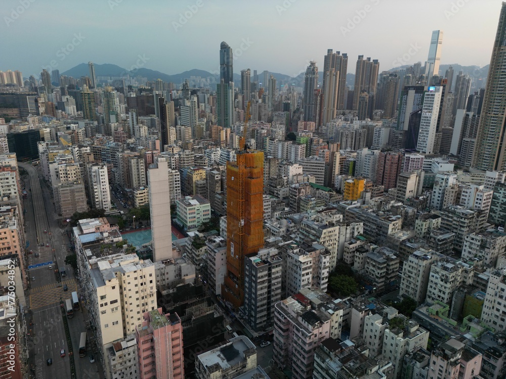 Fototapeta premium Aerial view of modern city buildings in Kowloon area. Hong Kong.