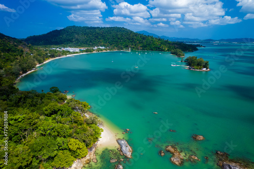 Blue ocean with a green shoreline and a mountain in the background, Pantai Kok, Langkawi,Malaysia © Stéphane Bidouze
