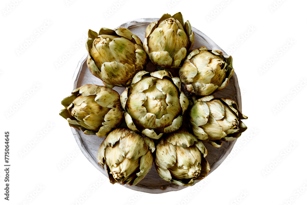 Obraz premium Fresh and raw artichokes on a table, topview and isolated