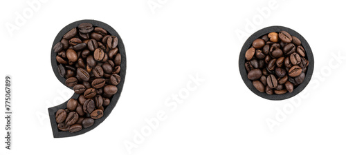 Point and comma marks made with coffee beans isolated on white background.