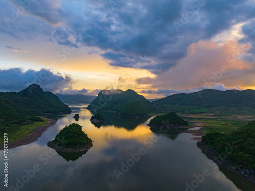 Summer lake in Oriental Guilin, Hainan, China, is burning with clouds