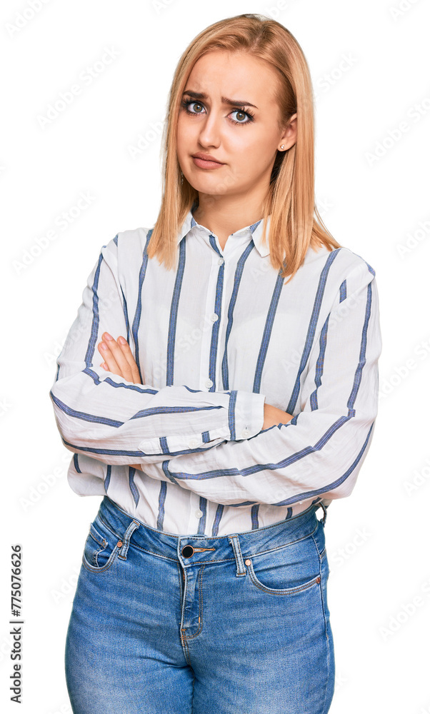 Beautiful caucasian woman wearing casual clothes looking to the side with arms crossed convinced and confident Beautiful caucasian woman wearing casual clothes looking to the side with arms crossed convinced and confident
