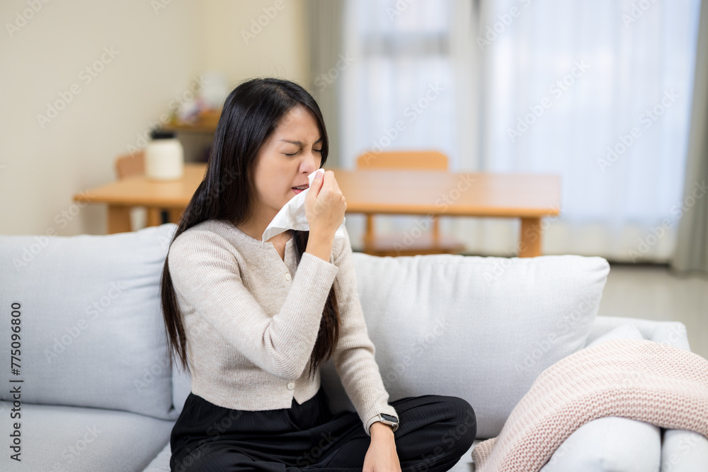 Woman flu and sneeze at home Woman flu and sneeze at home