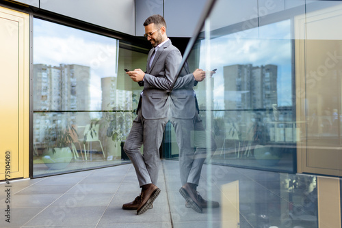 Confident Businessman Smili...