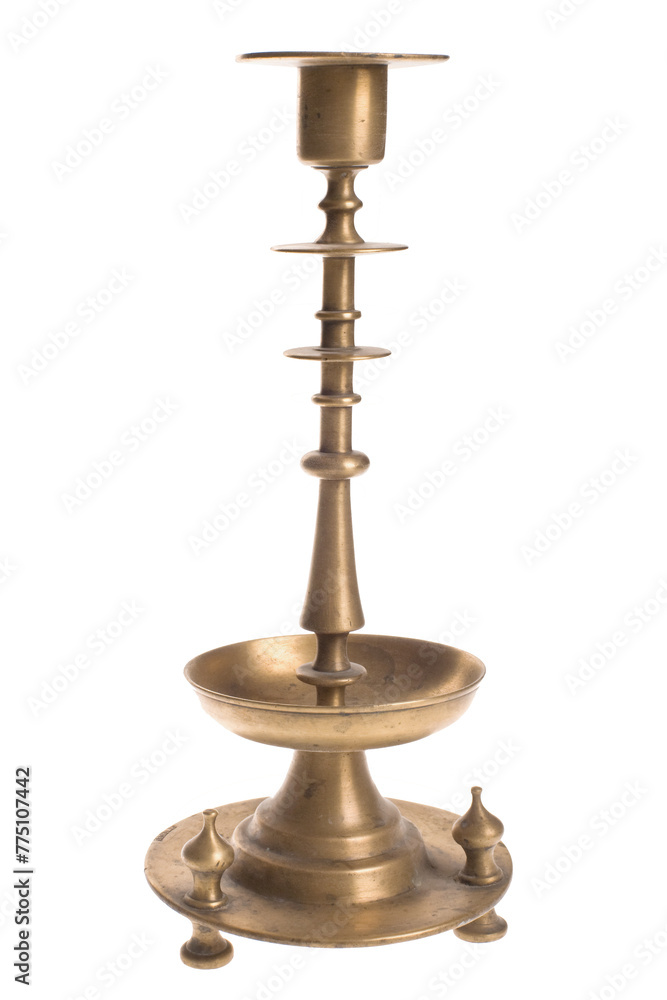 Antique metal candelabra for candles on a white background Antique metal candelabra for candles on a white background