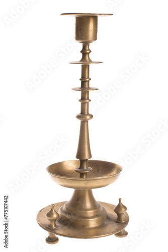 Antique metal candelabra for candles on a white background