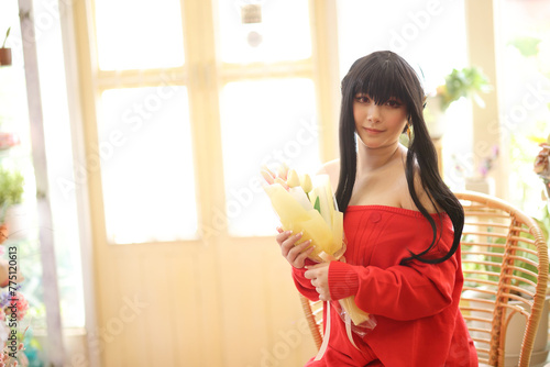Portrait of a beautiful young woman Cosplay with red sweater