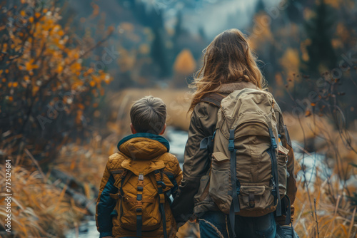 A mother and son enjoying a nature hike together, bonding over their shared love for the outdoors. Concept of maternal bonding and quality time spent together. Generative Ai.