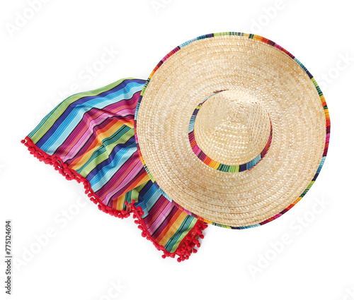 Mexican sombrero hat and colorful poncho isolated on white  top view