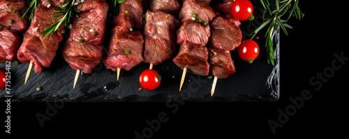 Grilled meat skewers shish kebab on black background tasty grilled shashlik on a plate 