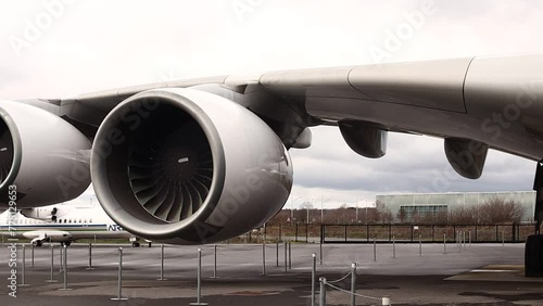 Airplane engines on the wing. White Two turbines. A double-decker plane