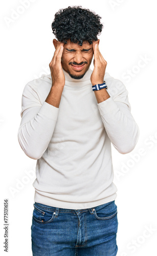 Young arab man wearing casual winter sweater with hand on head, headache because stress. suffering migraine.