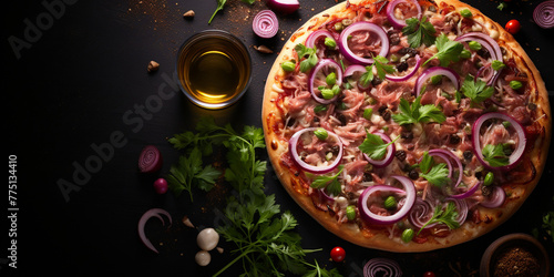 Top view of tuna and onion pizza with tomato sauce, mozzarella, tuna, red onion, and olives, with copy space, dark concrete background Menu concept. Delicious tasty Italian food diet