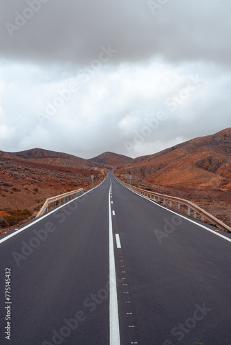 Asphalt winding mountain roads. In the desert area of Fuerteventura.